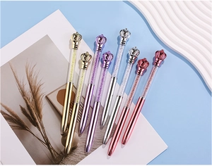 Detail of creative crown crystal ballpoint pens with shimmering rhinestone filling