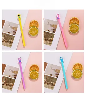 Detail showing cartoon bee gel pens in yellow pink purple and blue with silicone toppers