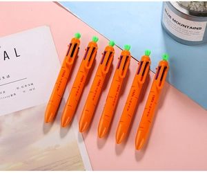 Close-up of 6-pack cute carrot shaped multi-color retractable ballpoint pens for journaling