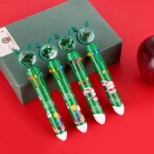 Detail of Christmas 10-color ballpoint pen with green sequins and cartoon deer antlers