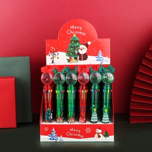 Close-up of 10-color Christmas pens in display box featuring reindeer and Santa designs