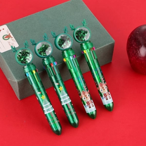 Detail of 10-color Christmas ballpoint pens with reindeer toppers in a green gift box