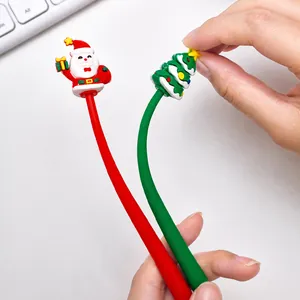 Detail of Christmas silicone pen charms featuring Santa Claus and green tree characters