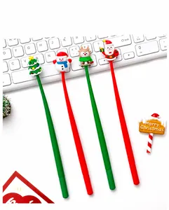 Detail of four Christmas silicone pens with 3D Santa, deer, snowman, and tree toppers