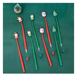 Close-up of Christmas gel pens featuring Santa, Snowman, Reindeer, and Tree silicone toppers