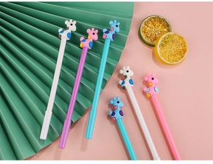 Close-up of cute cartoon giraffe pens in pastel colors on a pink background
