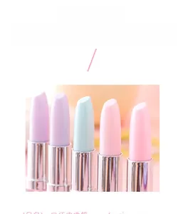 Detail view of lipstick-shaped gel pens in pastel colors with metallic silver barrels