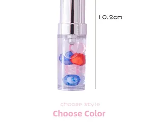 Detail view of lipstick-shaped gel pen measuring 10.2cm with heart-shaped glitters