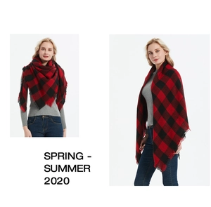 Detail of red and black buffalo check scarf with soft frayed edges and versatile styling