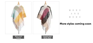 Detail of hooded plaid ponchos in green-yellow and burgundy colors with long fringe