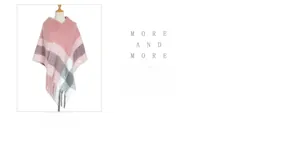 Detail of pink and grey plaid poncho with tassel fringe and chunky knit texture