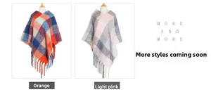 Detail of checkered knit ponchos with thick tassels in orange and pastel pink shades