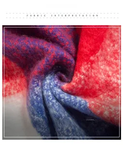 Close-up of soft knit plaid fabric with a colorful thick yarn texture and fuzzy handle