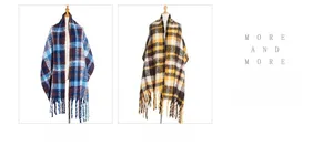 Detail of checkered scarves with thick tassels in blue and brown color patterns