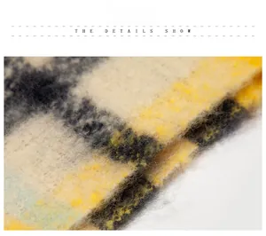 Detailed texture of thick ginger and grey plaid knit scarf with soft brushed mohair fibers
