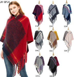 Thick checkered women's poncho shawl with tassels in various colors for winter