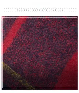 Close-up of soft brushed knit fabric with thick tassel details and plaid pattern