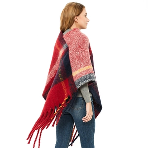 Plaid knitted poncho cape for women with thick fringe trim and colorful check pattern