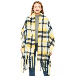 Oversized plaid scarf in yellow and blue with soft mohair feel and long tassel trim