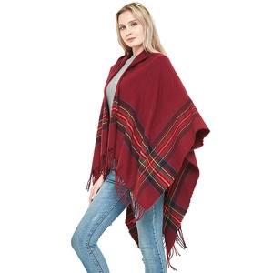 Women's vintage knit poncho in dark red plaid with tassels and hood for autumn and winter