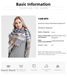 Detail of plaid triangle scarf with fringe edges in blue grey yellow color scheme