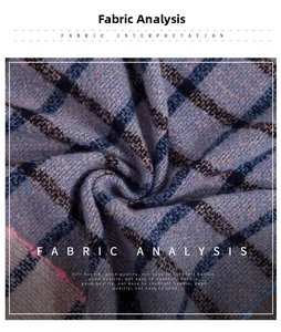 Macro detail of thick plaid fabric showing soft texture and high-density woven blue pattern
