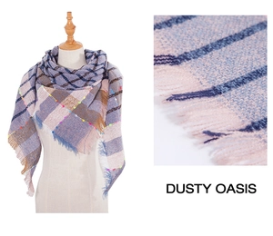 Detail of soft plaid scarf with tassels in dusty oasis pink and blue colors