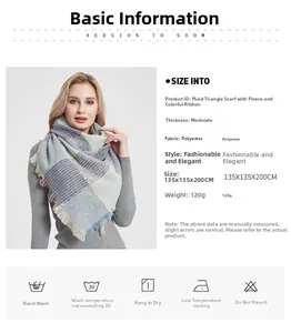 Detail of plaid patterned triangular scarf showing thick polyester texture and soft colors