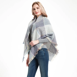 Women's plaid tassel shawl scarf featuring blue, grey and beige checkered knit pattern