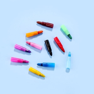 Detailed view of 10-color creative building block crayons in various vibrant shades
