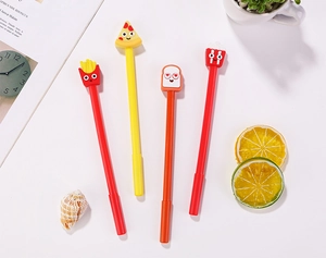 Close-up of cute cartoon food gel pens featuring fries, pizza, toast, and popcorn toppers