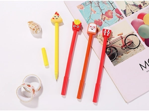 Close-up of cute cartoon food gel pens featuring pizza, fries, toast and popcorn shapes