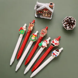 Close-up of 6-piece Christmas retractable gel pens with Santa and reindeer charms