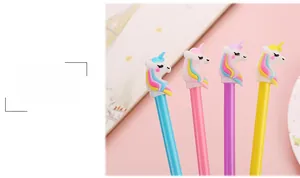 Set of four pastel unicorn gel pens in light blue, pink, purple, and yellow on a pink background