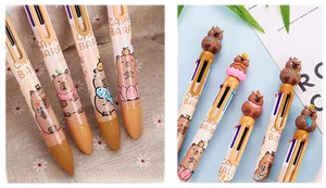 Close-up of a Capybara themed multi-color retractable ballpoint pen with cartoon graphics