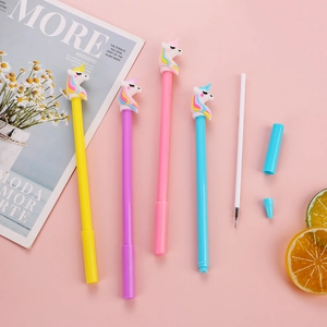 Cute unicorn gel pen set with 4 colorful pens and refill on a pastel pink background