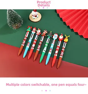 Close-up of 4-color Christmas ballpoint pens with cartoon Santa and elk toppers