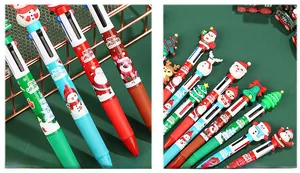 Detail of Christmas multi-color ballpoint pens with 3D Santa and reindeer silicone toppers