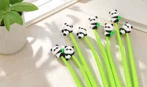 Detail of creative green gel pen with cute 3D silicone panda figure on top