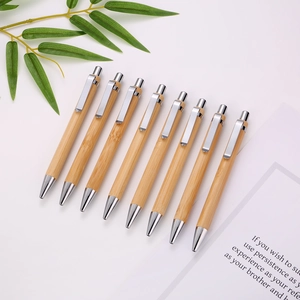 Set of 8 eco-friendly natural bamboo retractable ballpoint pens with silver metal clips