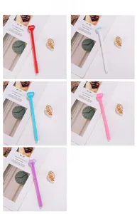 Detail of cute creative pens with 3D heart-shaped toppers in five vibrant colors