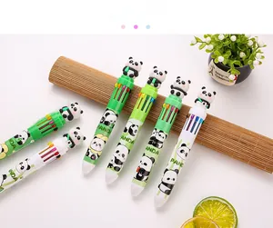 Close-up of 10-color panda press ballpoint pen with cute silicone topper and bamboo decor