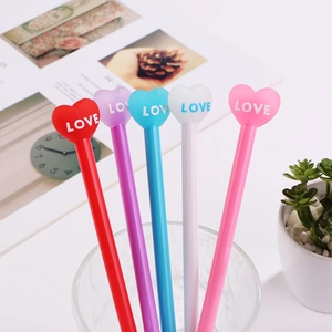5-pack of colorful heart-shaped creative pens with LOVE print in a glass cup display