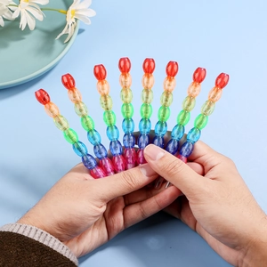Colorful multi-section stacking pencils for kids featuring clear rainbow bead design