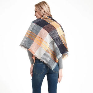 Plaid knitted shawl for women featuring orange grey checks and decorative fringe trim