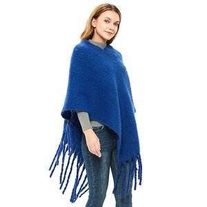 Thick navy blue loop yarn knitted poncho with long tassels for women in autumn and winter