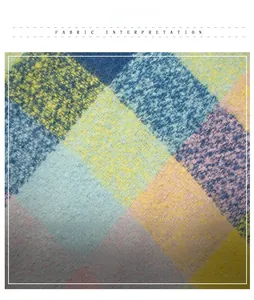 Close-up of soft plaid fabric texture with colorful large checks and fuzzy finish