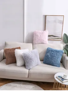 Detail of plush single-sided PV velvet pillow covers in five colors on a sofa