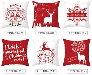 Detail view of six Christmas pillow covers with red reindeer and snowflake prints