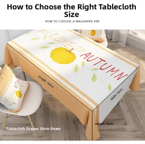 Detail of Nordic cotton linen tablecloth with autumn pumpkin and welcome typography